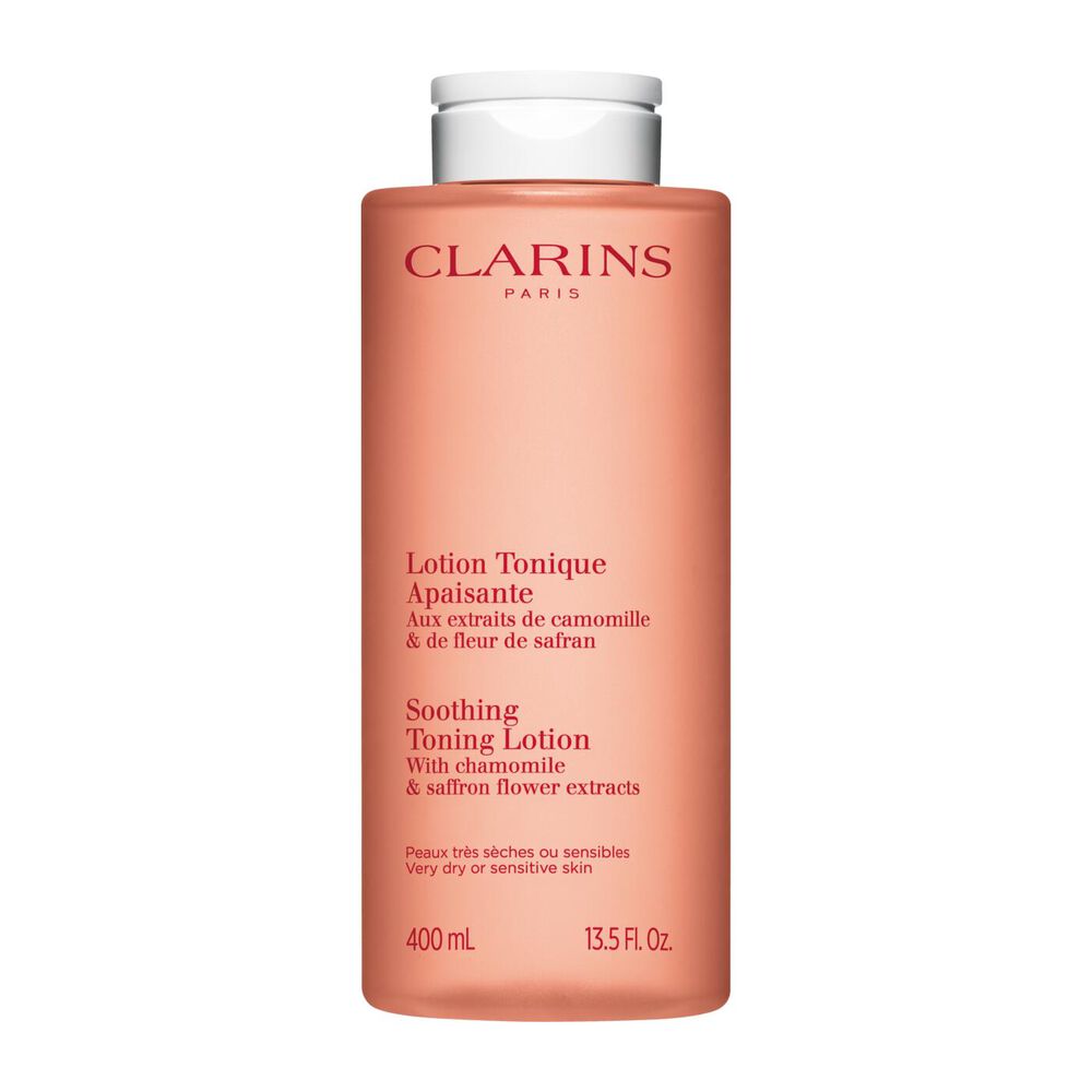 Foto del envase naranja de la Lotion Tonique Apaisante de Clarins, que preserva el equilibrio de la piel con camomila natural y el extracto de azafr&aacute;n