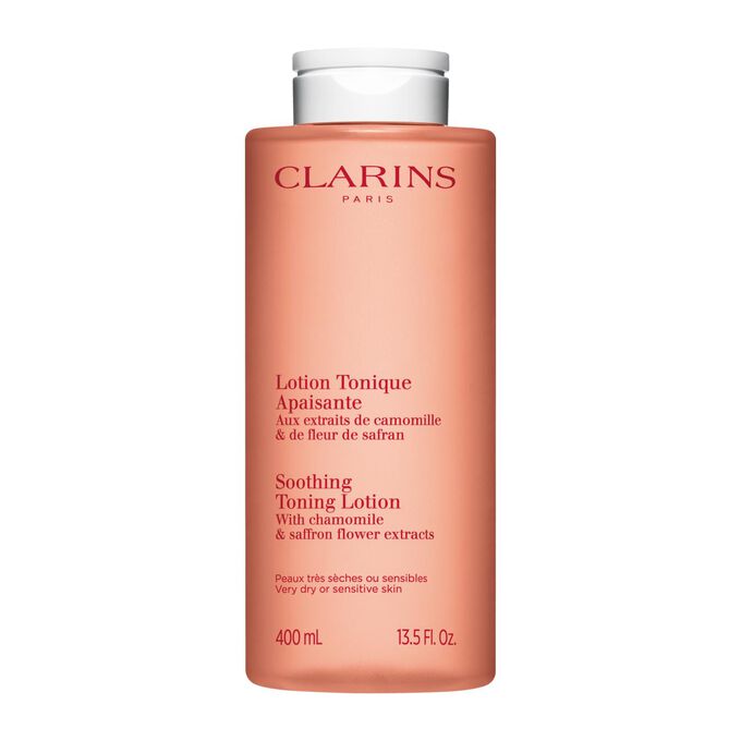 Foto del envase naranja de la Lotion Tonique Apaisante de Clarins, que preserva el equilibrio de la piel con camomila natural y el extracto de azafr&aacute;n