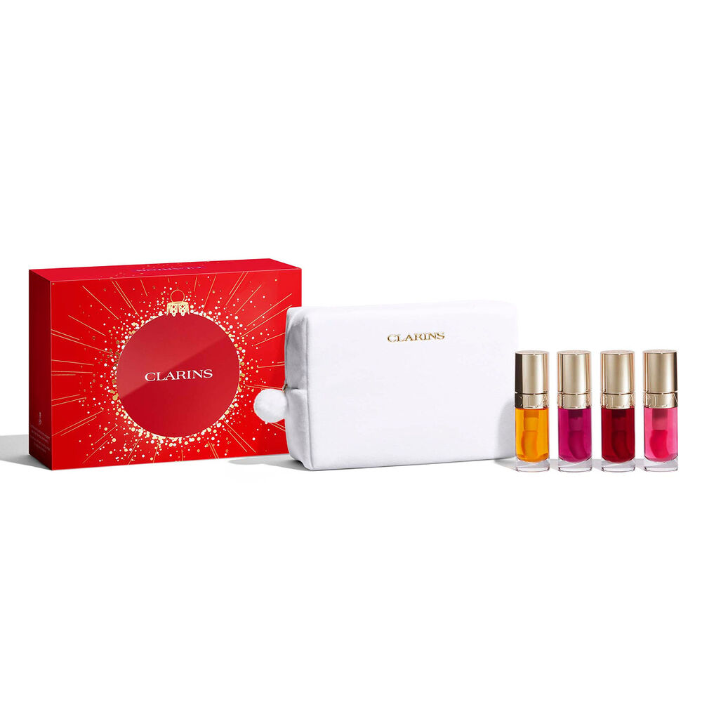 Foto del cofre regalo de Navidad de aceites labiales de Clarins, con tonos imprescindibles para la belleza diaria y unos labios realzados de forma natural