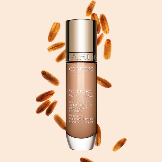 Clarins Skin Illusion Full Coverage muestra su elegante dise&ntilde;o y su atractivo envase, la base de maquillaje ideal para una tez impecable y natural.