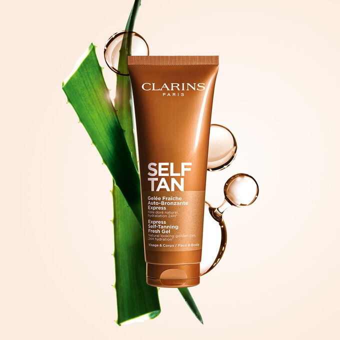 Foto del producto Express Self-Tan Gel de Clarins con aloe vera, mol&eacute;culas de DHA y eritrulosa, destacando sus dos ingredientes bronceadores clave.