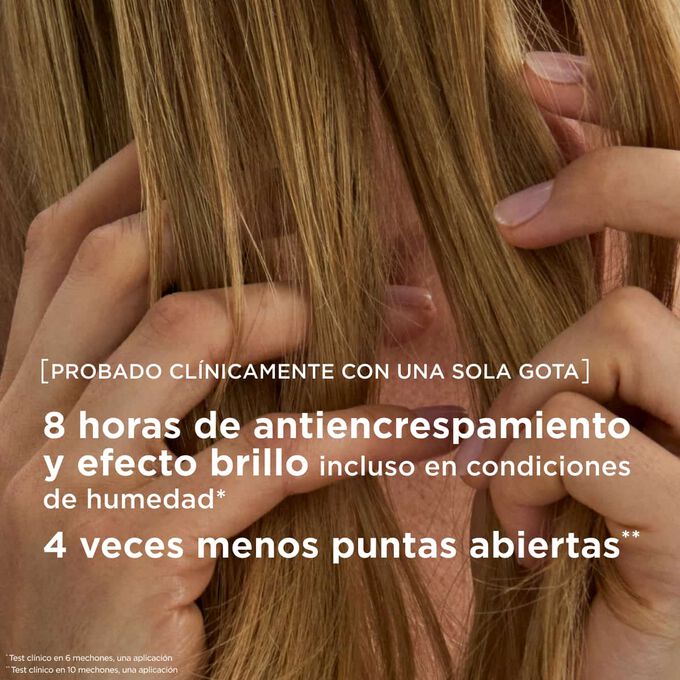 Tratamiento capilar con aceite antiencrespamiento que proporciona ocho horas de brillo y reduce las puntas abiertas hasta cuatro veces, incluso en condiciones de humedad.