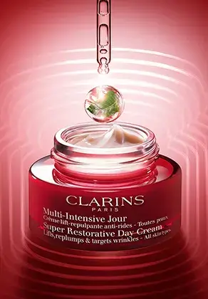 Foto de Multi-Intensive Crema Alta Exigencia Día con una pipeta y una gota