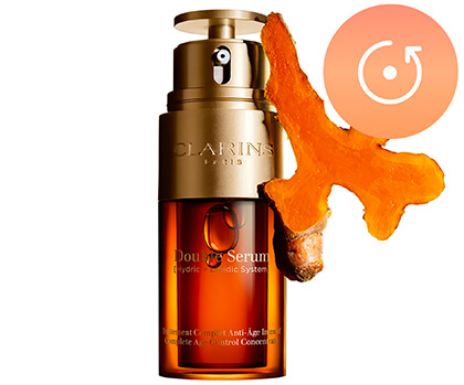 Foto de Double Serum Textura Ligera con el principal ingrediente al lado, el extracto de cúrcuma