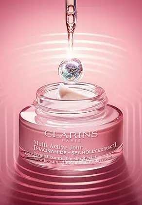 Foto de Multi-Active Día Crema con una pipeta y una gota