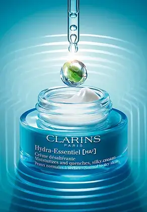 Foto de la crema de día Hydra-Essentiel [HA2] con una pipeta y una gota